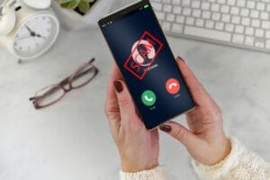 Mobile phone with inbound scam phone call.
