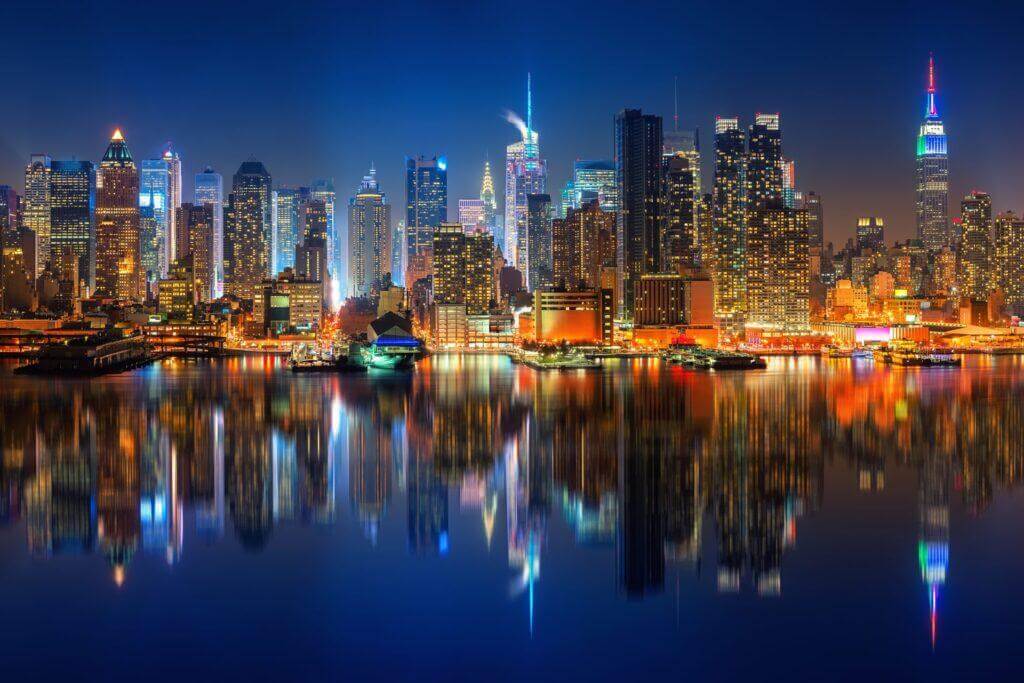 City and bay skyline at night.