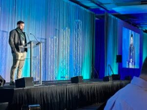 Daniel Goffen introduces cybersecurity expert Rachel Wilson at the AD PHCP conference
