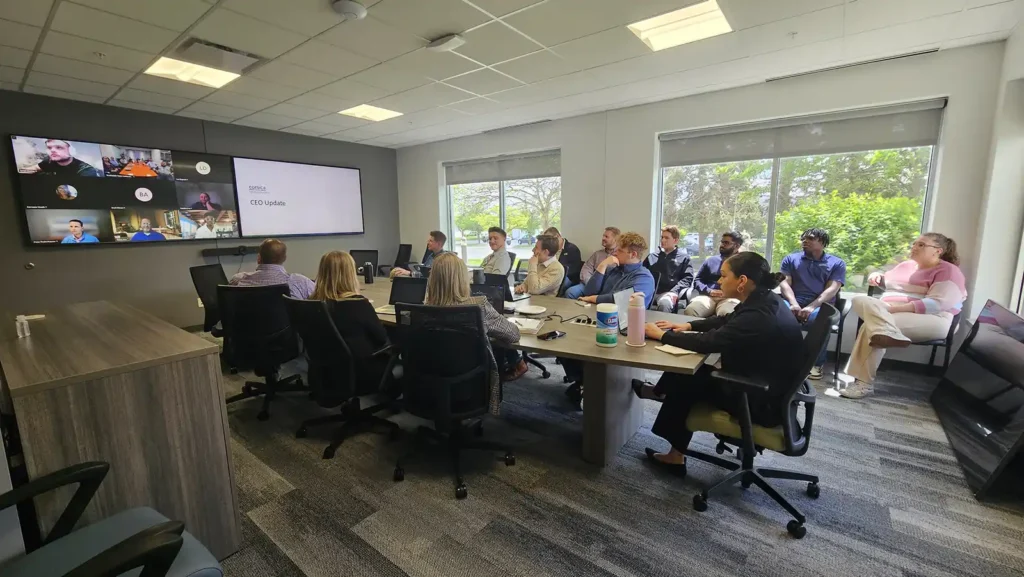 Corsica Technologies Leadership in a meeting