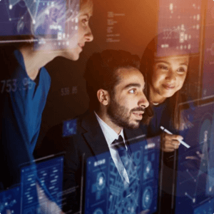 Employees in a meeting reviewing cybersecurity business projects.