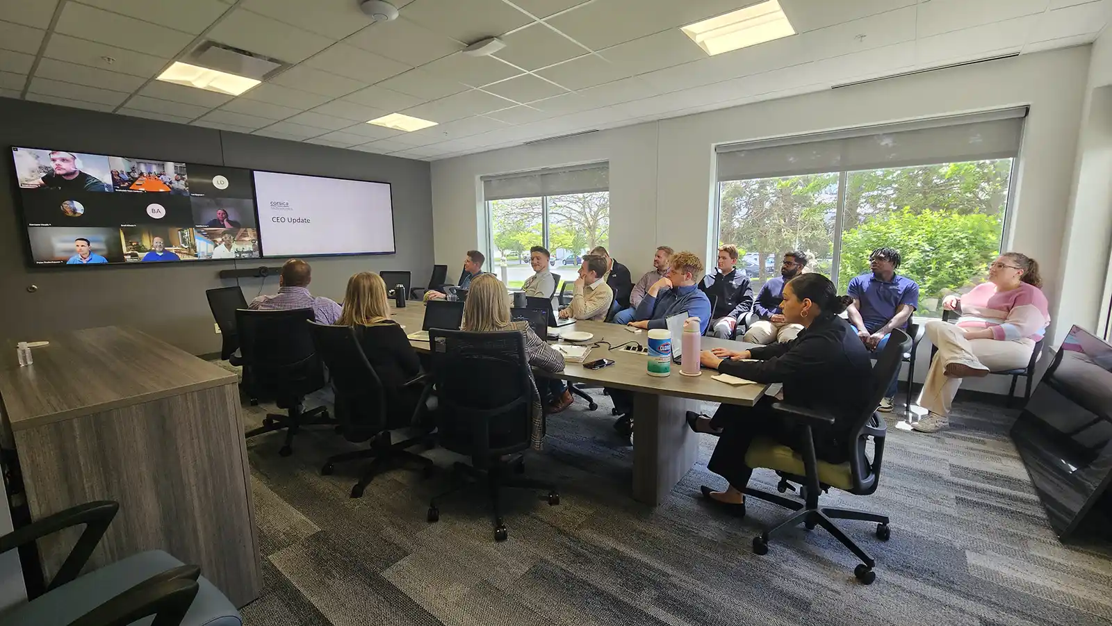 Corsica Technologies Leadership in a meeting