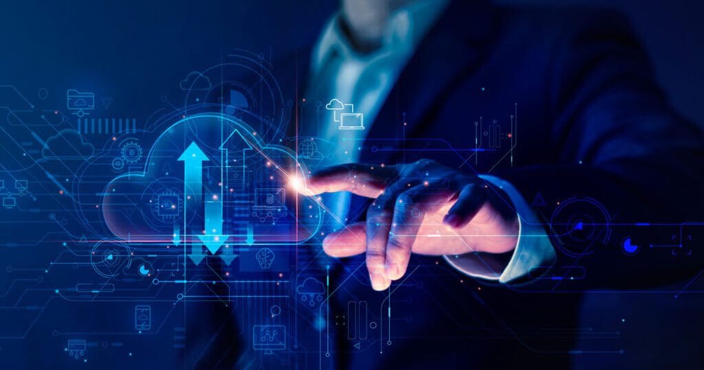 Business man touching clear computer screen display.